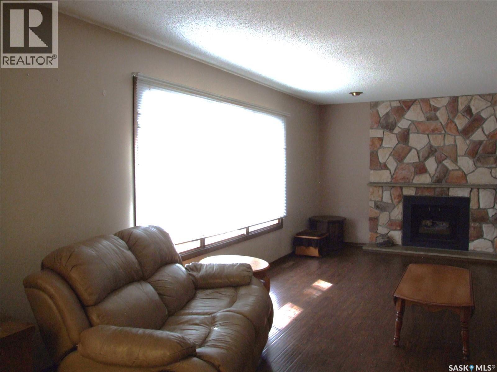 301 5Th Street W, Leader, SK - Indoor Photo Showing Living Room With Fireplace