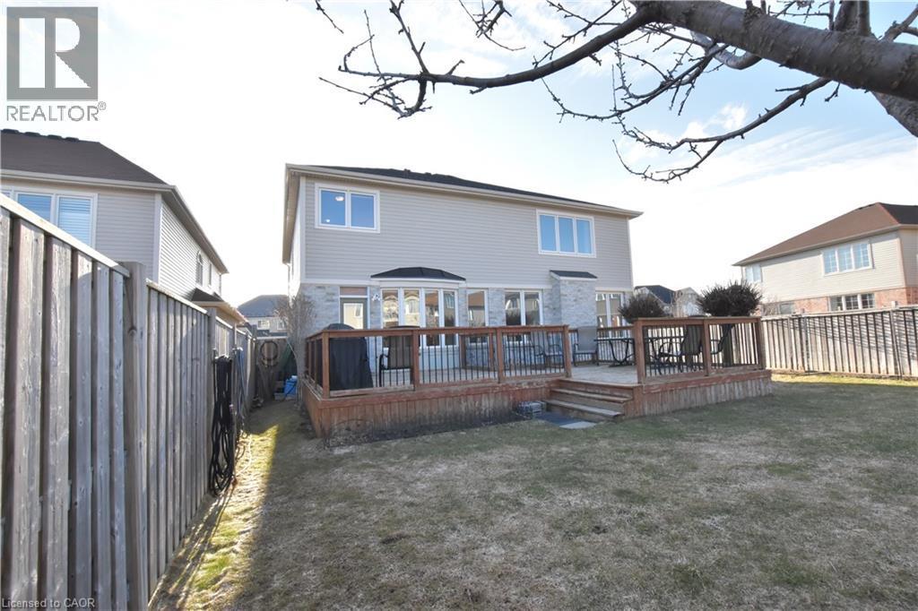 Back of property with a deck and a fenced backyard - 512 Terrington Crescent, Kitchener, ON - Outdoor With Deck Patio Veranda With Exterior