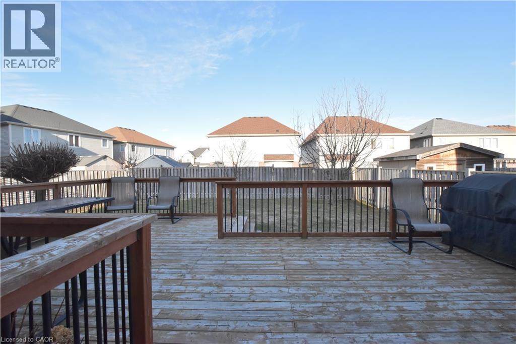 Wooden deck with a residential view, a fenced backyard, and grilling area - 512 Terrington Crescent, Kitchener, ON - Outdoor With Deck Patio Veranda With Exterior