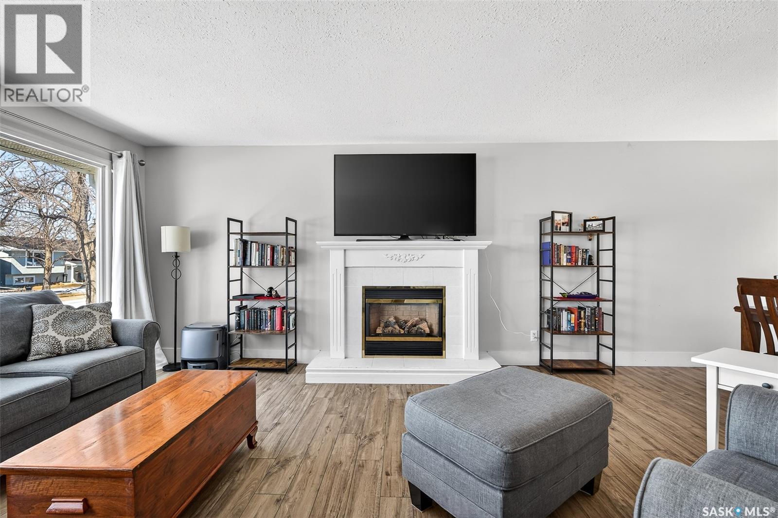 1321 Prince Crescent, Moose Jaw, SK - Indoor Photo Showing Living Room With Fireplace