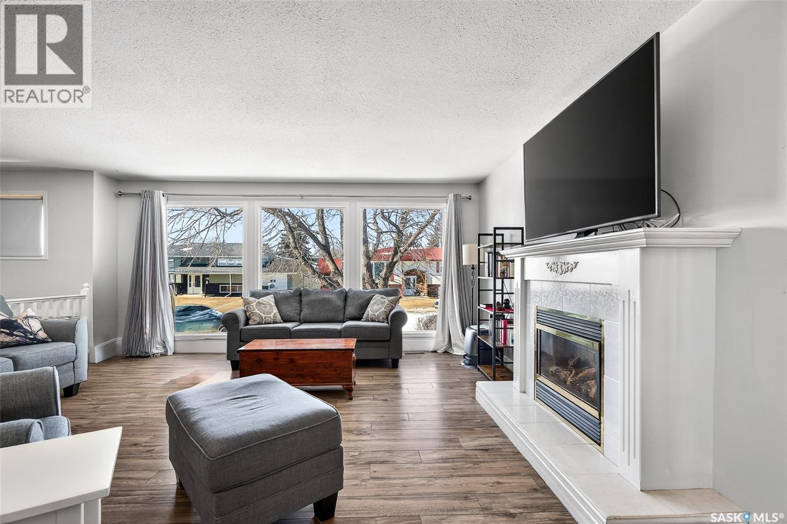1321 Prince Crescent, Moose Jaw, SK - Indoor Photo Showing Living Room With Fireplace