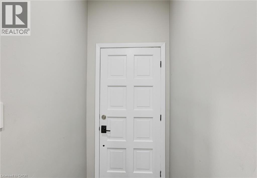 View of doorway to outside - 7 Cardill Crescent, Waterloo, ON - Indoor Photo Showing Other Room