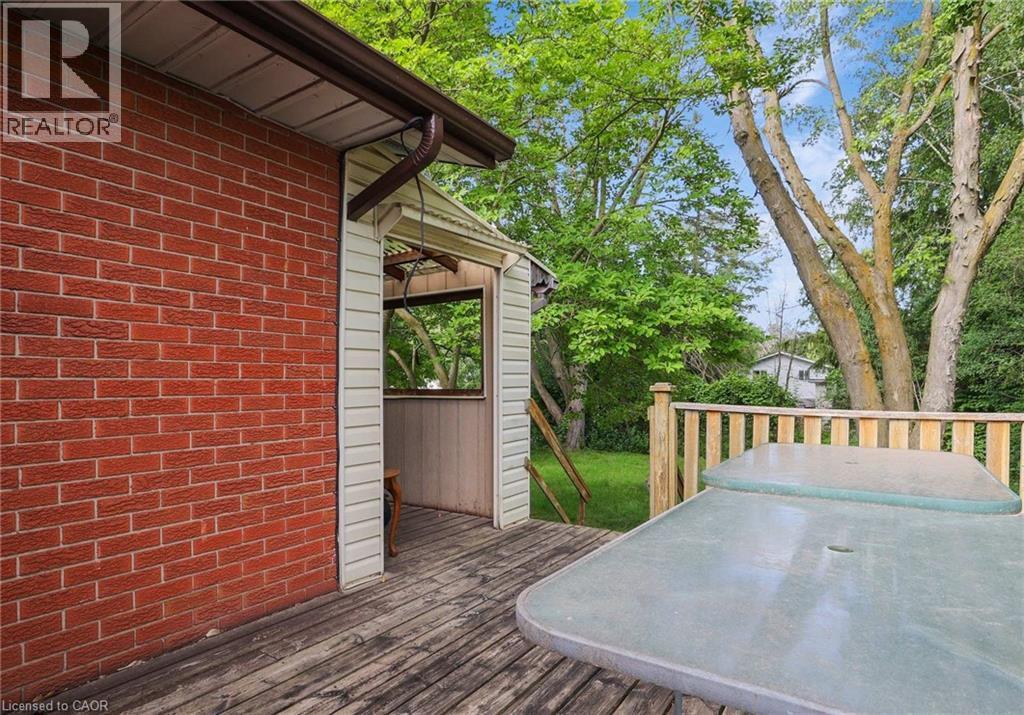 View of wooden terrace - 7 Cardill Crescent, Waterloo, ON - Outdoor With Deck Patio Veranda With Exterior