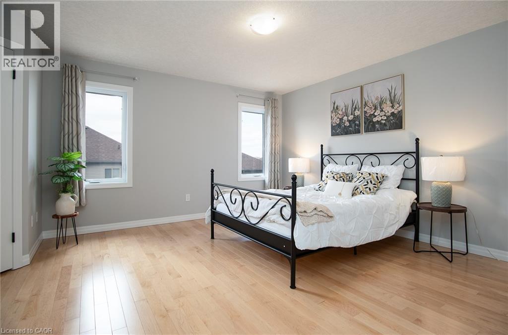 Bedroom featuring light wood-style floors - 346 Chokecherry Crescent, Waterloo, ON - Indoor Photo Showing Bedroom