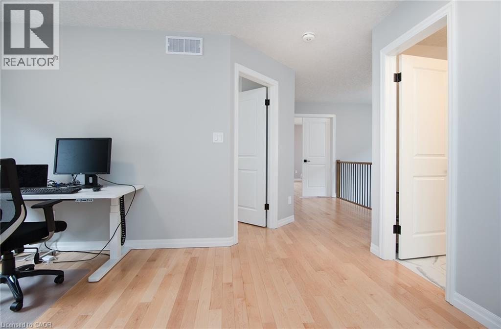 Office featuring light wood-style flooring and baseboards - 346 Chokecherry Crescent, Waterloo, ON - Indoor Photo Showing Office