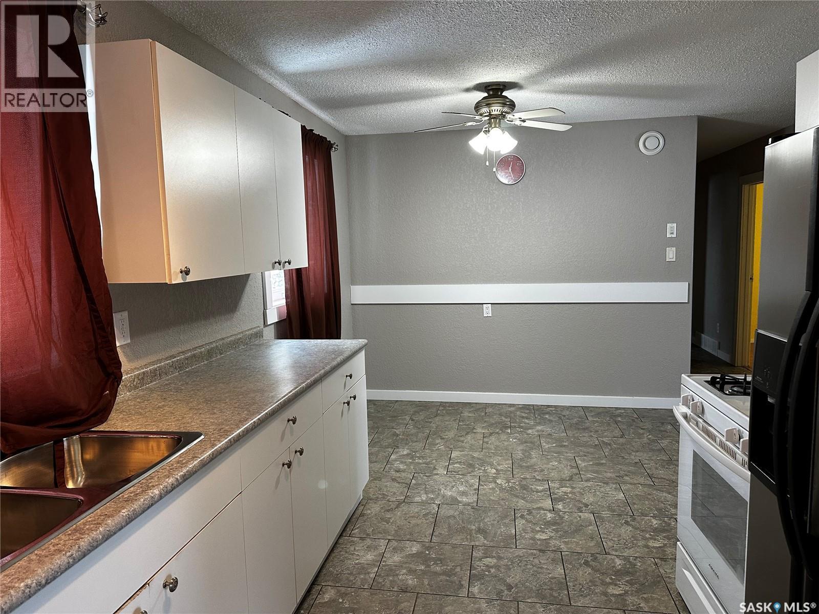 619 Guy Place, La Ronge, SK - Indoor Photo Showing Kitchen