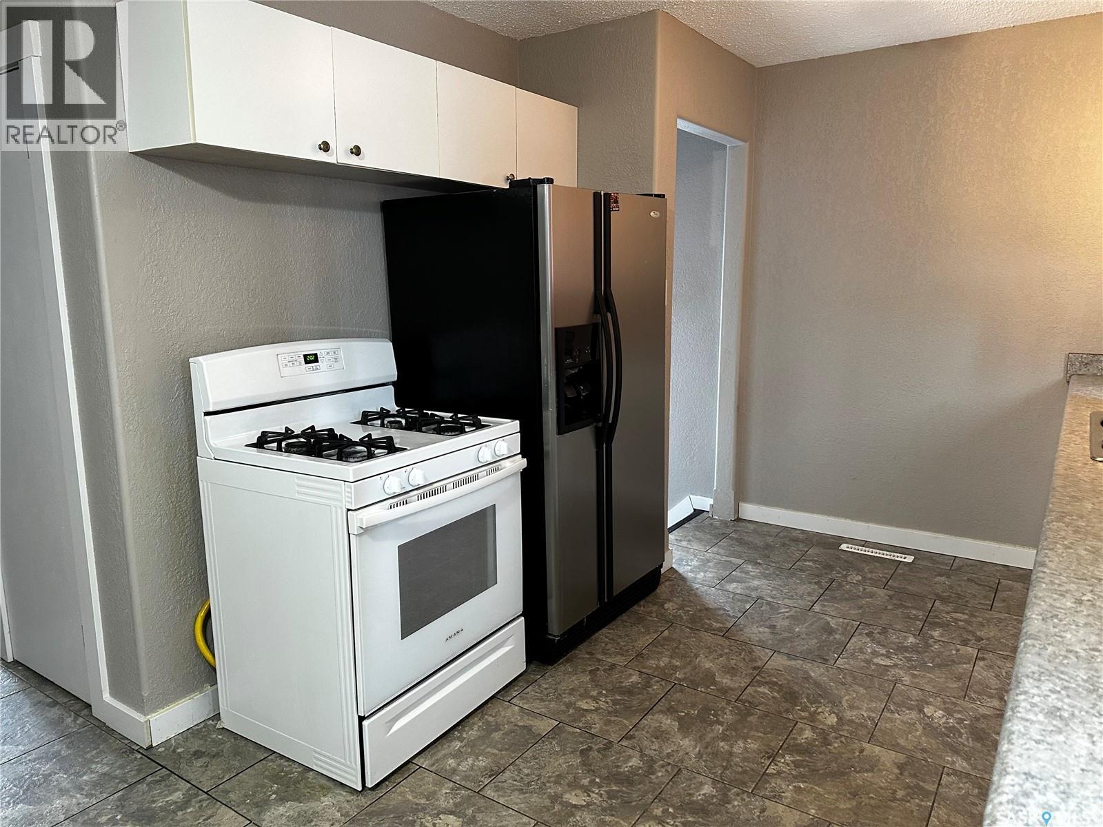 619 Guy Place, La Ronge, SK - Indoor Photo Showing Kitchen