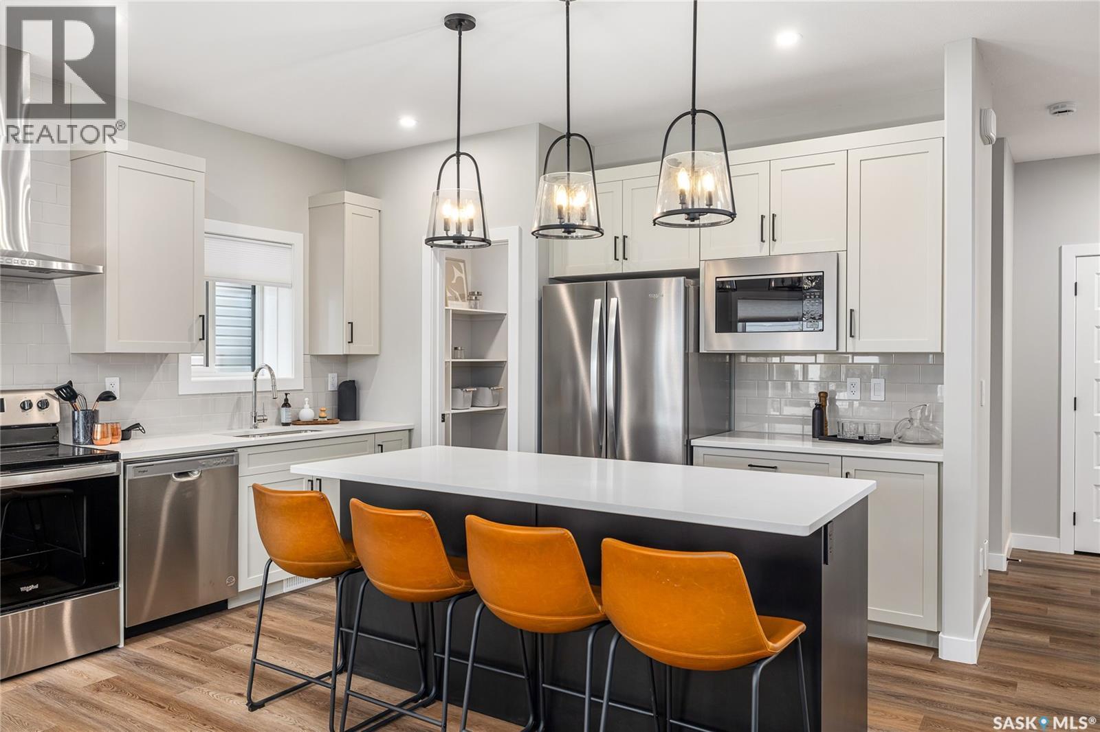 12 Vancouver Crescent, Pilot Butte, SK - Indoor Photo Showing Kitchen With Upgraded Kitchen