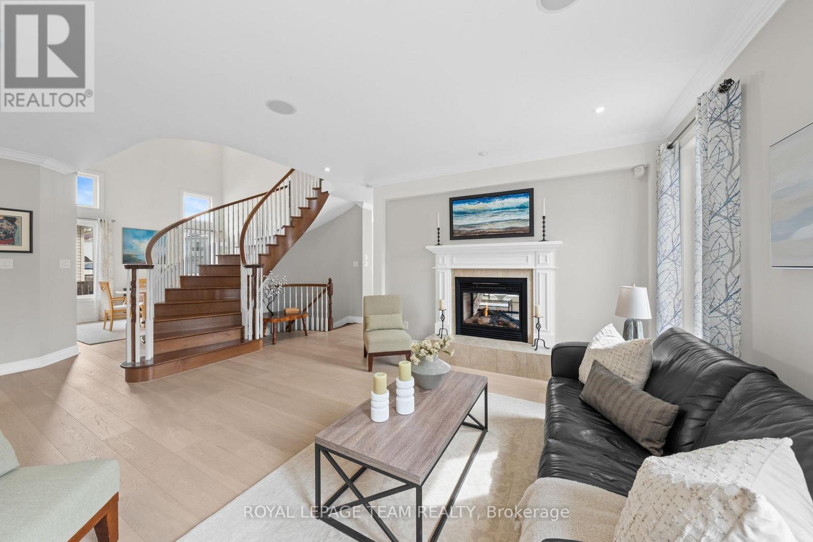 144 Whernside Terrace, Ottawa, ON - Indoor Photo Showing Living Room With Fireplace