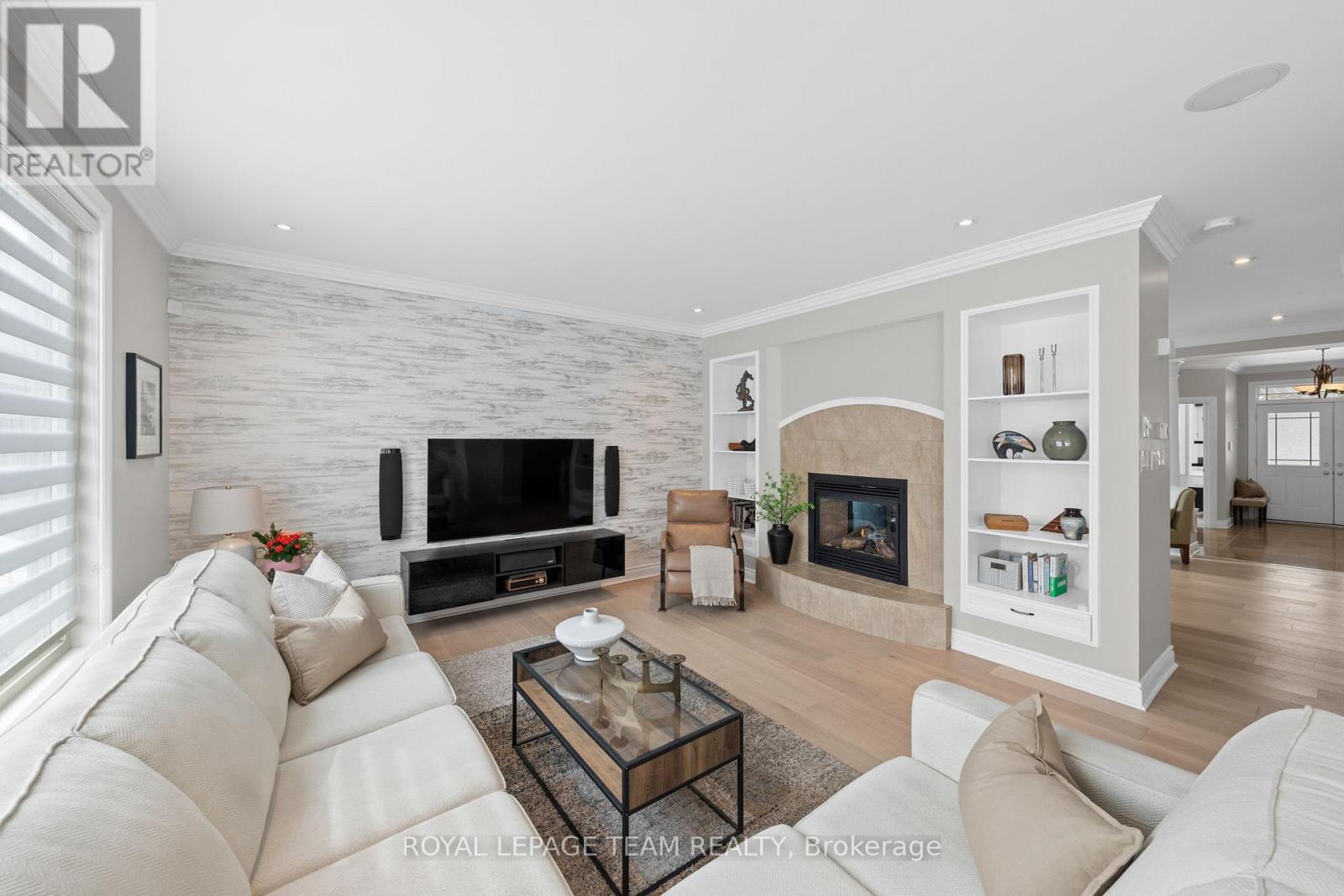 144 Whernside Terrace, Ottawa, ON - Indoor Photo Showing Living Room With Fireplace
