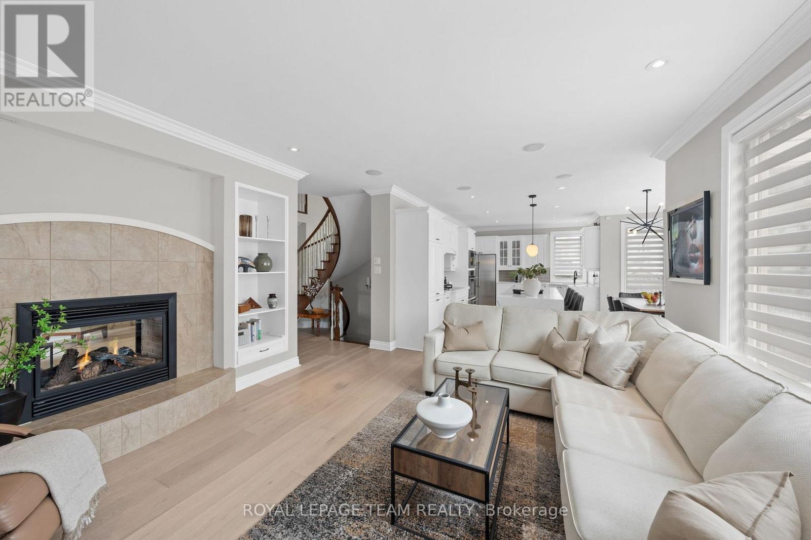 144 Whernside Terrace, Ottawa, ON - Indoor Photo Showing Living Room With Fireplace