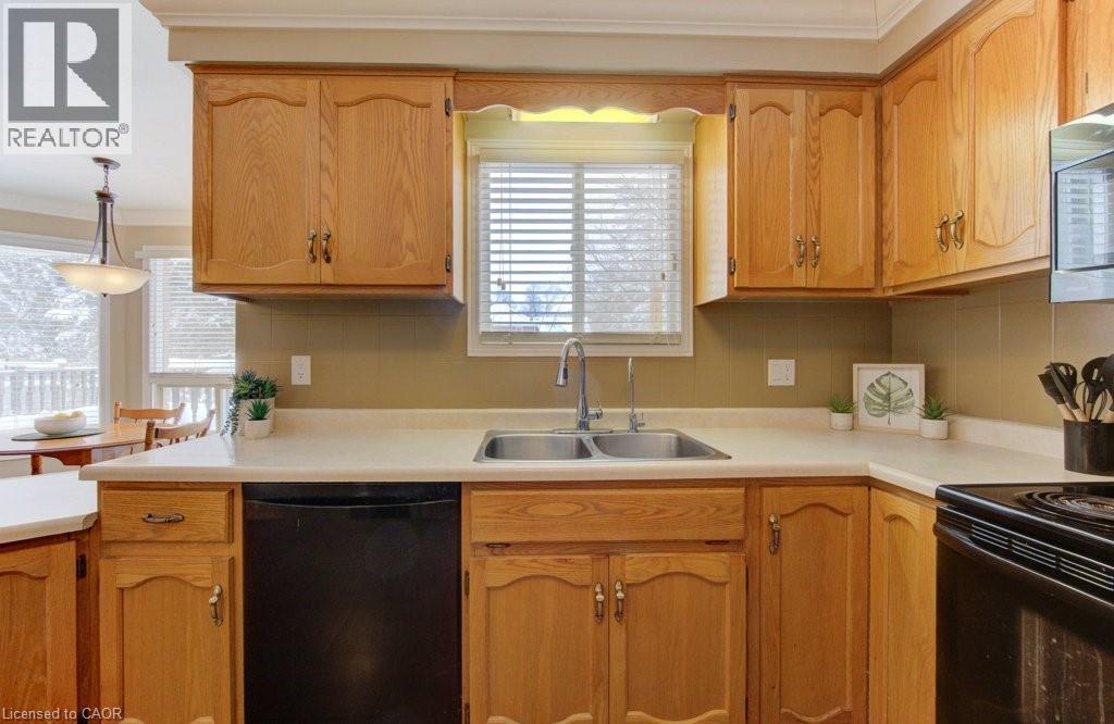 Double kitchen sink - 594 Hunters Place, Waterloo, ON - Indoor Photo Showing Kitchen With Double Sink