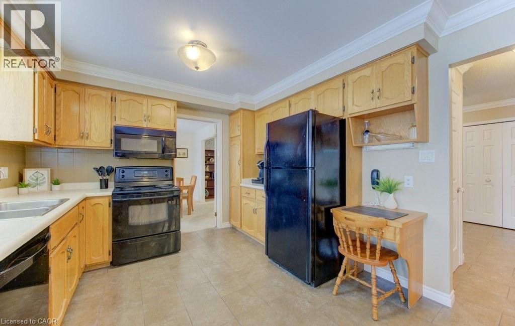 Pantry cabinet plus work station desk - 594 Hunters Place, Waterloo, ON - Indoor Photo Showing Kitchen