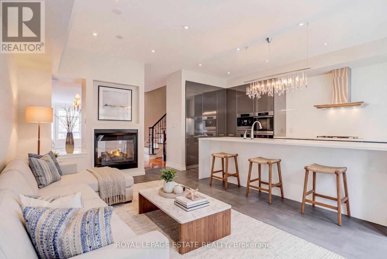 Family Room overlooking Kitchen virtually staged - 66 Compass Way, Mississauga, ON - Indoor Photo Showing Living Room With Fireplace