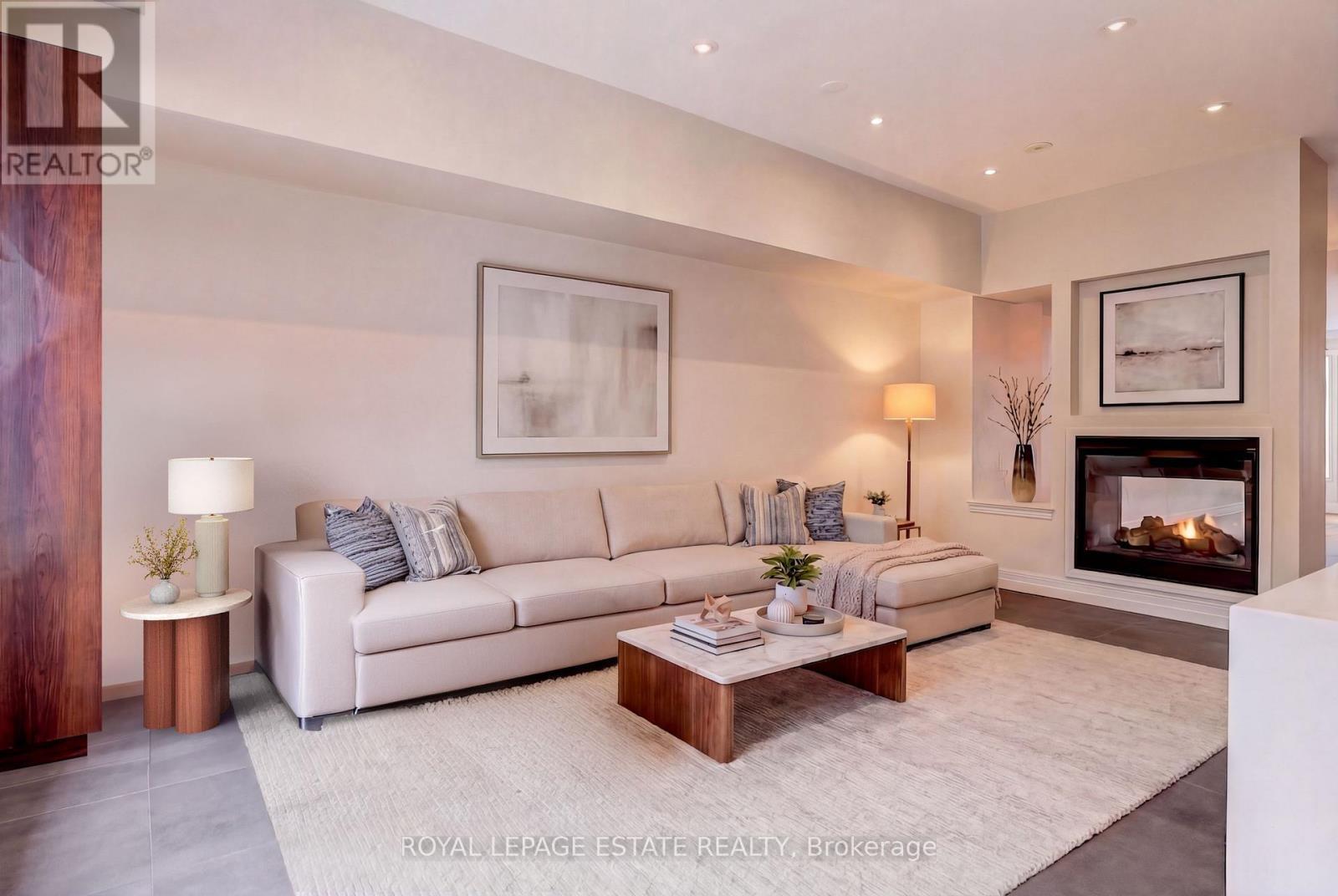 Family Room virtually staged - 66 Compass Way, Mississauga, ON - Indoor Photo Showing Living Room With Fireplace