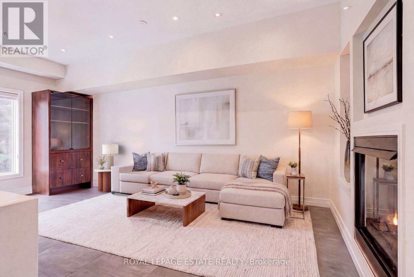 Family Room virtually staged - 66 Compass Way, Mississauga, ON - Indoor Photo Showing Living Room