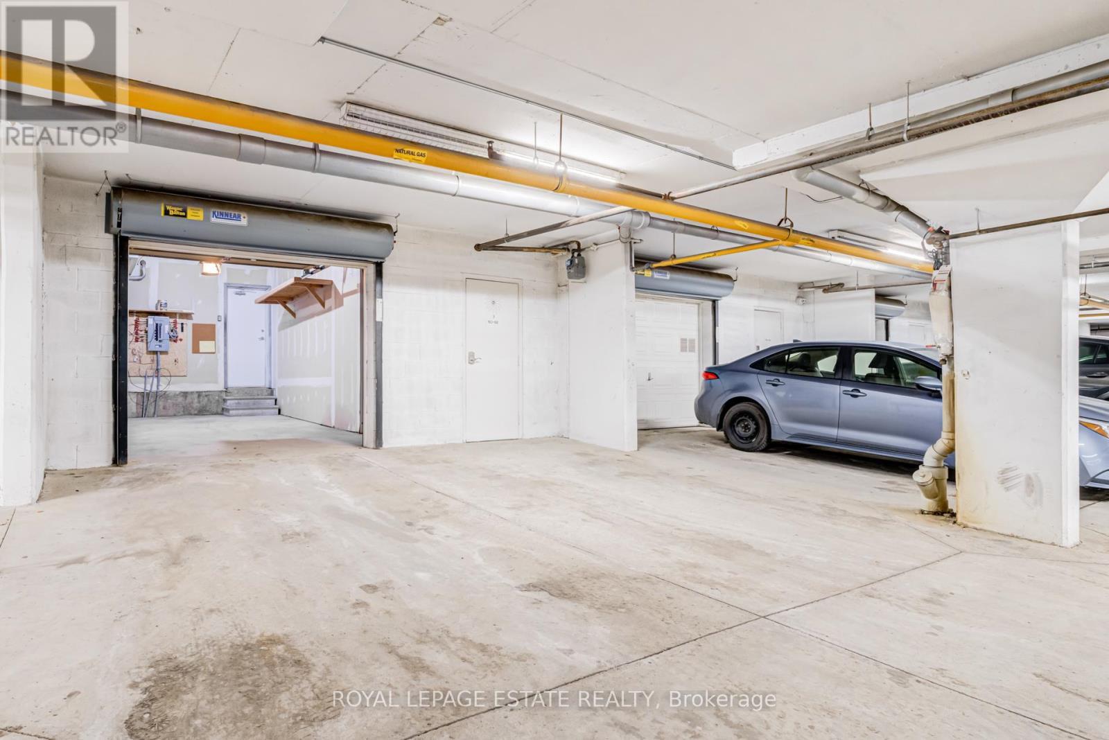 Additional underground parking for 2 cars - 66 Compass Way, Mississauga, ON - Indoor Photo Showing Garage
