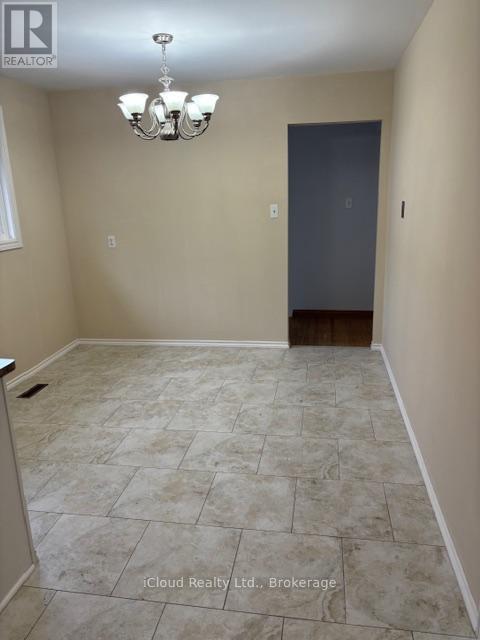 Ceramic Flooring - 4174 Woodington Drive, Mississauga, ON - Indoor Photo Showing Other Room