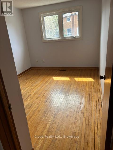 Strip Hardwood Floors - 4174 Woodington Drive, Mississauga, ON - Indoor Photo Showing Other Room
