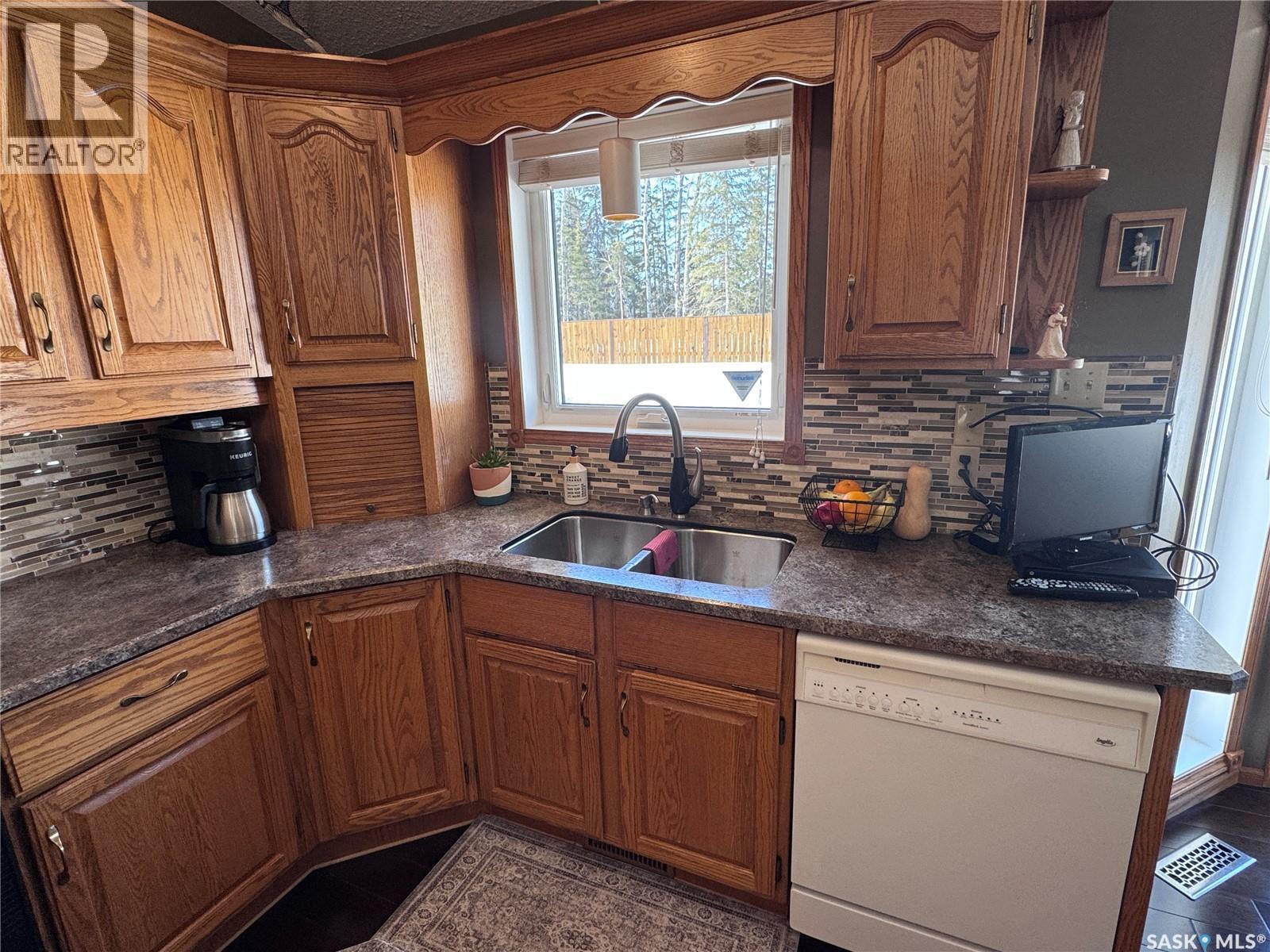 930 Sinotte Crescent, La Ronge, SK - Indoor Photo Showing Kitchen With Double Sink