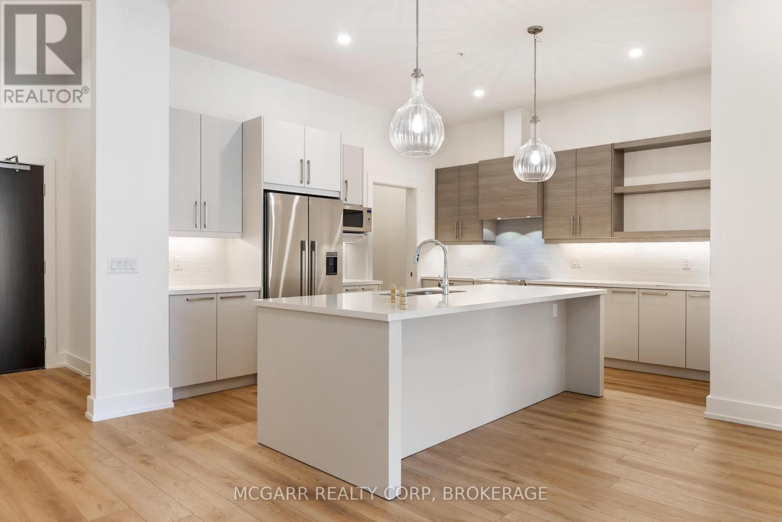 Extensive cabinetry and counter space - 507 - 77 Yates Street, St. Catharines (Downtown), ON - Indoor Photo Showing Kitchen With Stainless Steel Kitchen With Upgraded Kitchen