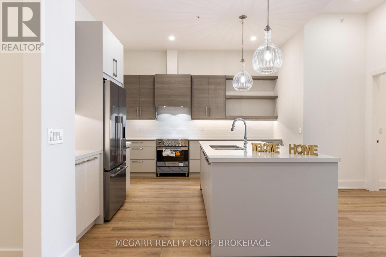 Four kitchen appliances - 507 - 77 Yates Street, St. Catharines (Downtown), ON - Indoor Photo Showing Kitchen With Upgraded Kitchen