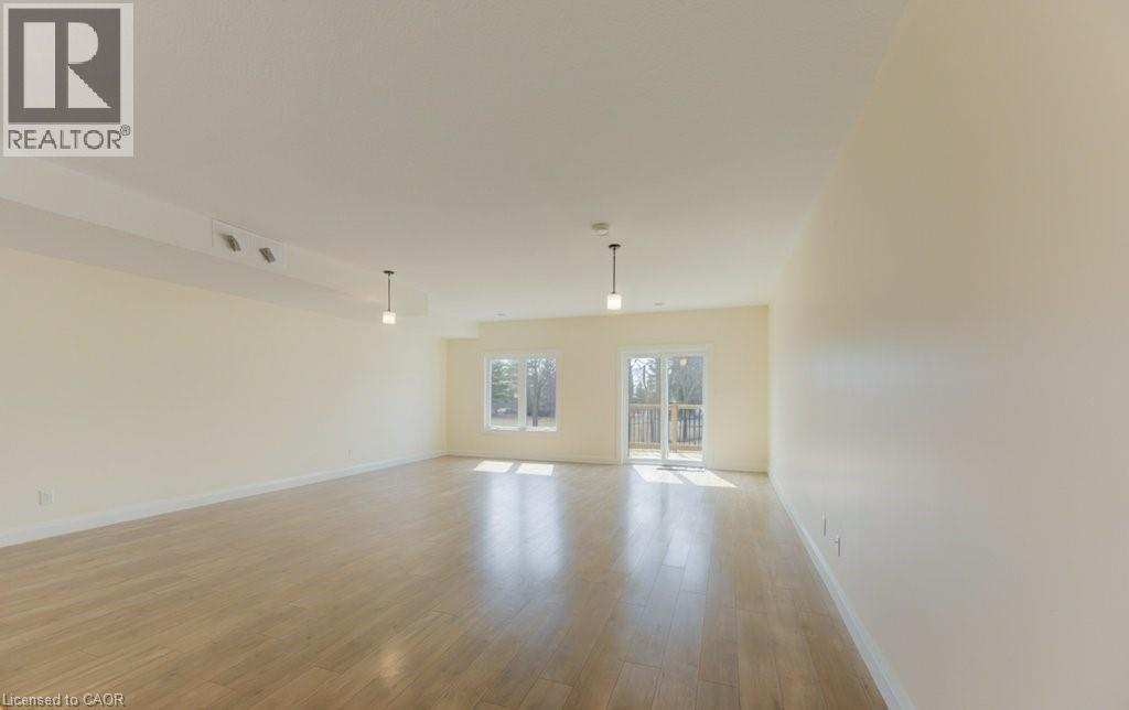 Spare room with light wood finished floors and baseboards - 113 Walter Street, Kitchener, ON - Indoor Photo Showing Other Room