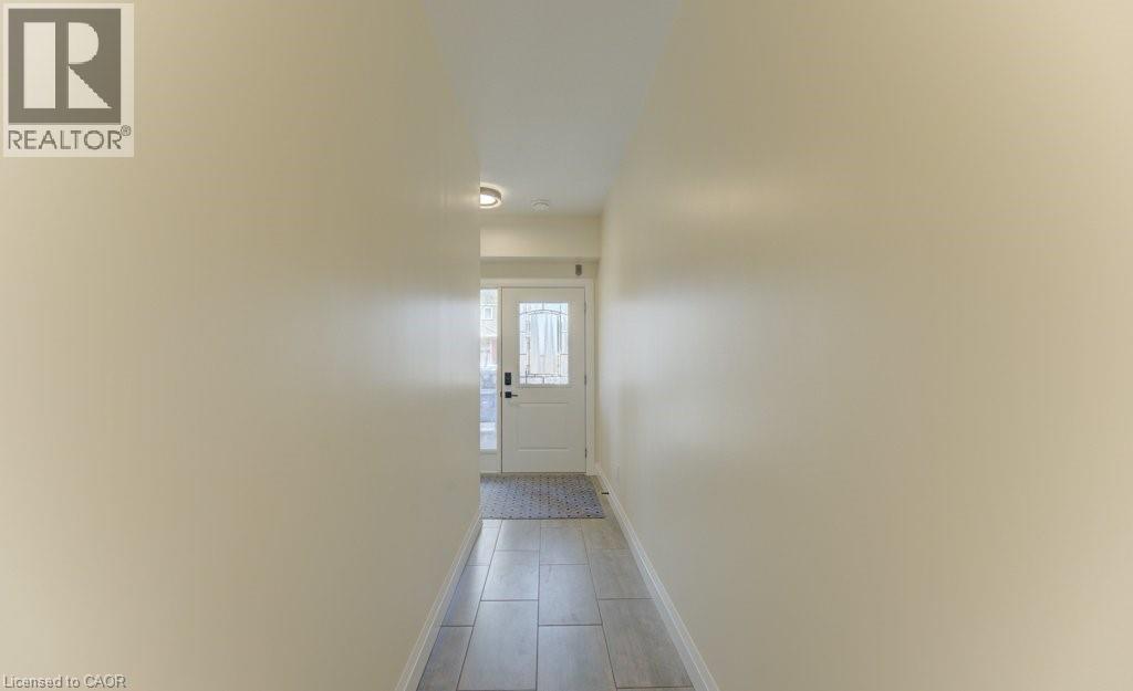 Hall with baseboards - 113 Walter Street, Kitchener, ON - Indoor Photo Showing Other Room