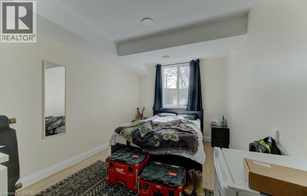 Bedroom with baseboards and light wood finished floors - 113 Walter Street, Kitchener, ON - Indoor Photo Showing Bedroom