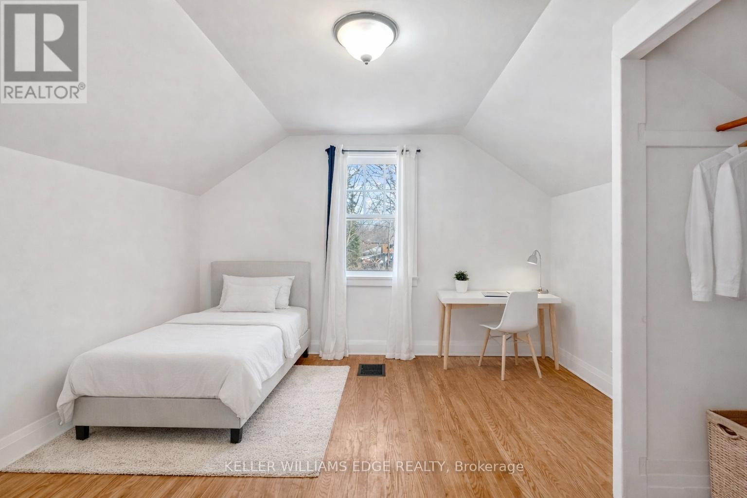 Digitally Staged - 23 Clifford Street, Hamilton, ON - Indoor Photo Showing Bedroom