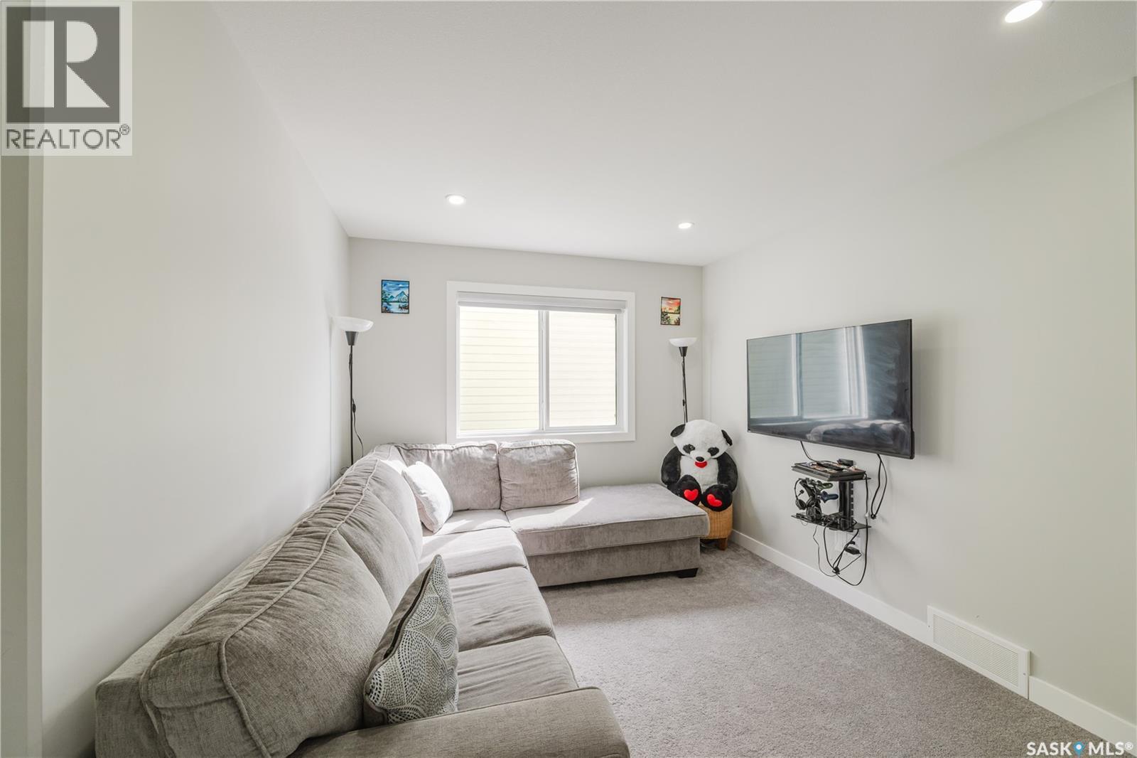 202 Cowessess Road, Saskatoon, SK - Indoor Photo Showing Living Room
