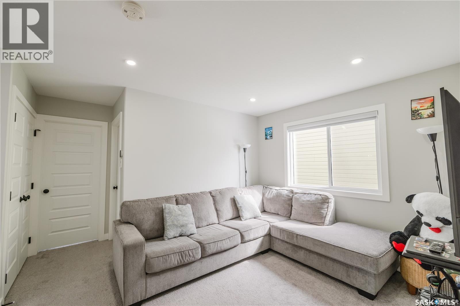 202 Cowessess Road, Saskatoon, SK - Indoor Photo Showing Living Room