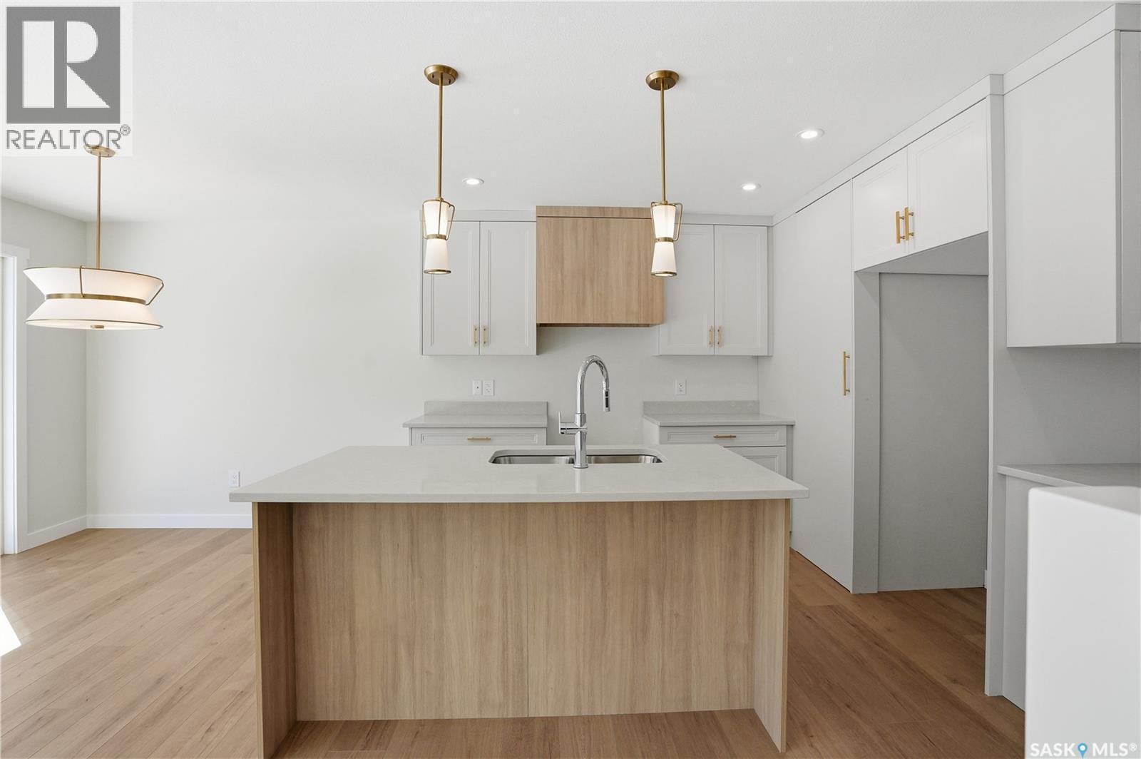 404 155 Mcfaull Way, Saskatoon, SK - Indoor Photo Showing Kitchen