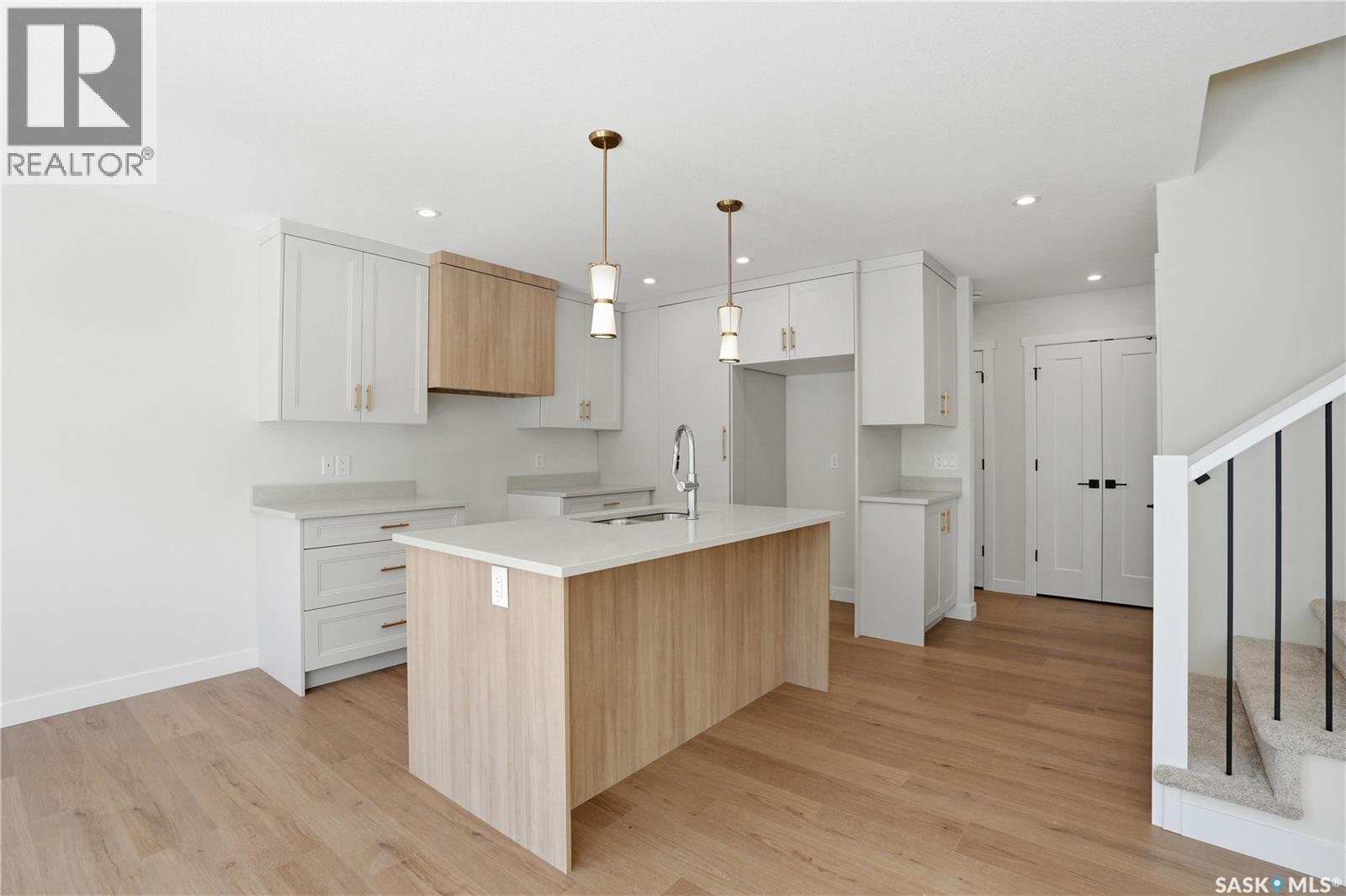 404 155 Mcfaull Way, Saskatoon, SK - Indoor Photo Showing Kitchen