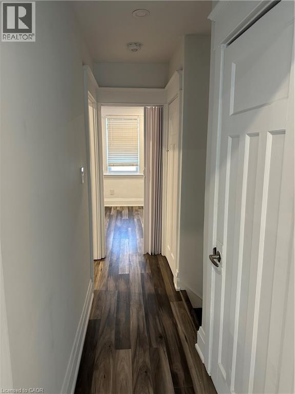 Hall with dark hardwood / wood-style floors - 1090 Cannon Street E, Hamilton, ON - Indoor Photo Showing Other Room