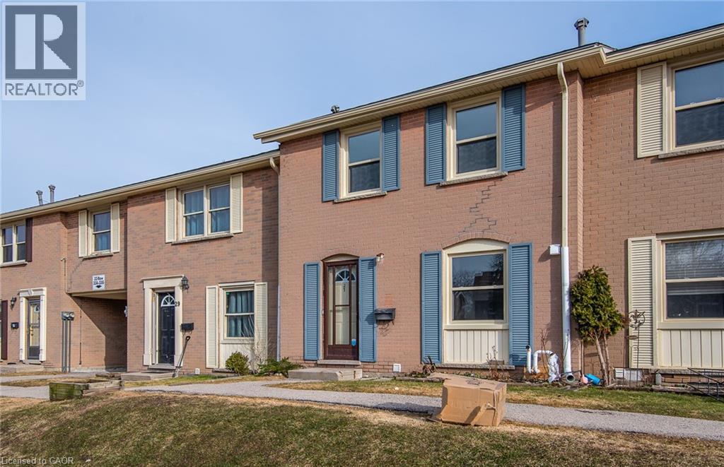 Colonial inspired home featuring brick siding - 27 Queenston Drive, Kitchener, ON - Outdoor