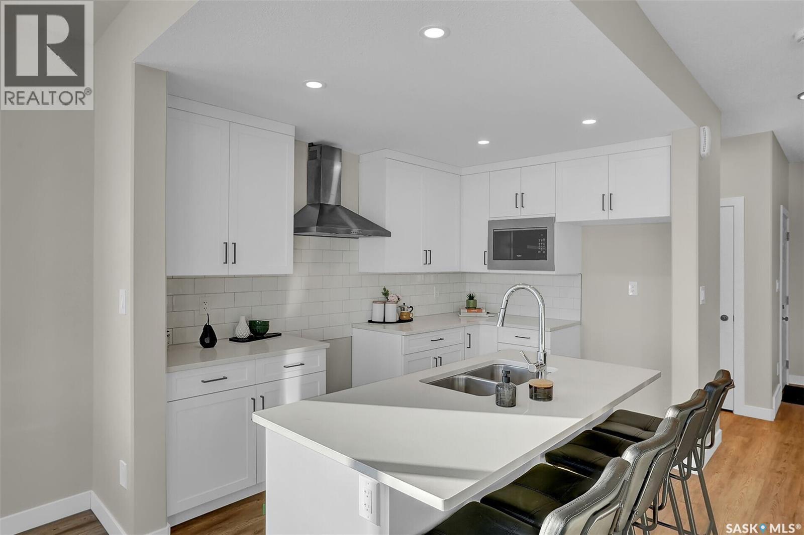 230 Kostiuk Crescent, Saskatoon, SK - Indoor Photo Showing Kitchen With Double Sink With Upgraded Kitchen