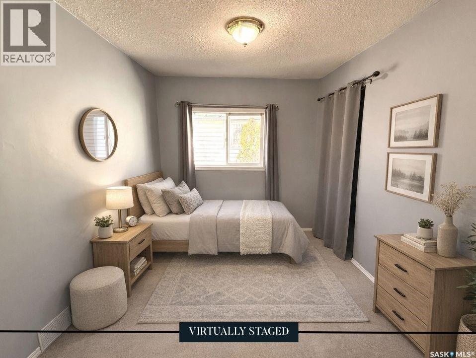 619 4Th Avenue Nw, Swift Current, SK - Indoor Photo Showing Bedroom