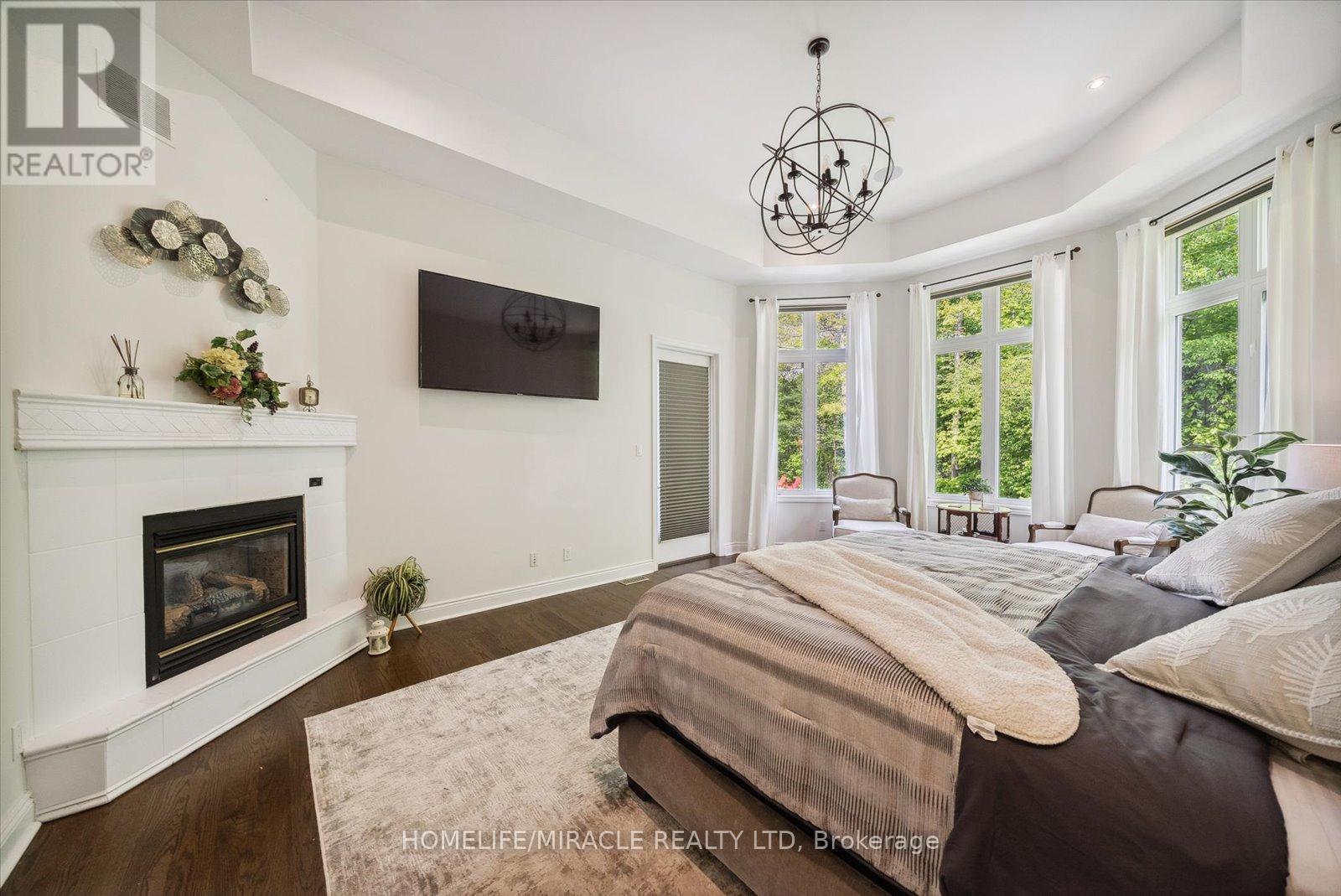 12 Deer Run, Uxbridge, ON - Indoor Photo Showing Bedroom With Fireplace