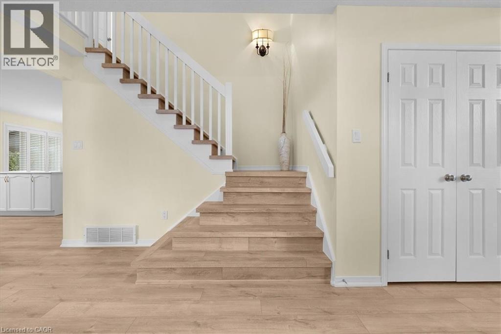 Stairway with wood finished floors - 90 Westlawn Drive, Hamilton, ON - Indoor Photo Showing Other Room