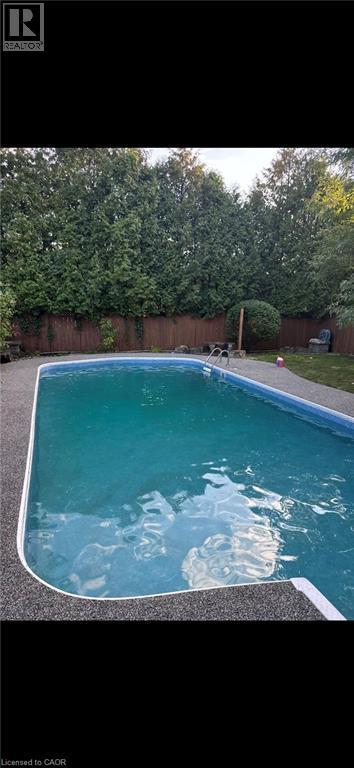 View of pool with a fenced backyard - 90 Westlawn Drive, Hamilton, ON - Outdoor With In Ground Pool With Backyard