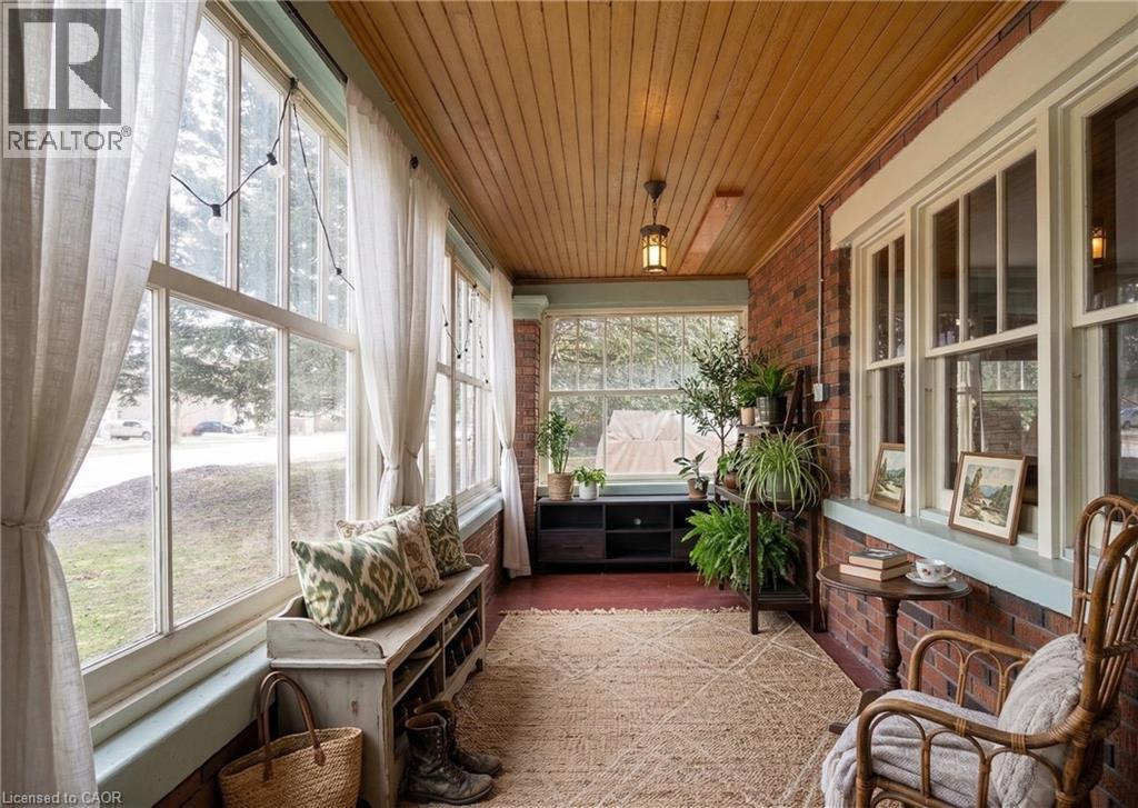 Virtually staged to provide a visual sense of space and proportion - 33 Main Street E, Drayton, ON - With Exterior