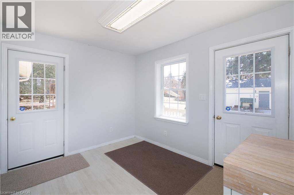 Doorways to outside from laundry room - 33 Main Street E, Drayton, ON - Indoor Photo Showing Other Room