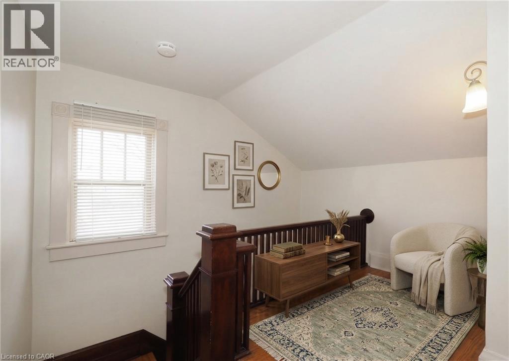 Virtual Staging of landing area at top of the stairs - 33 Main Street E, Drayton, ON - Indoor