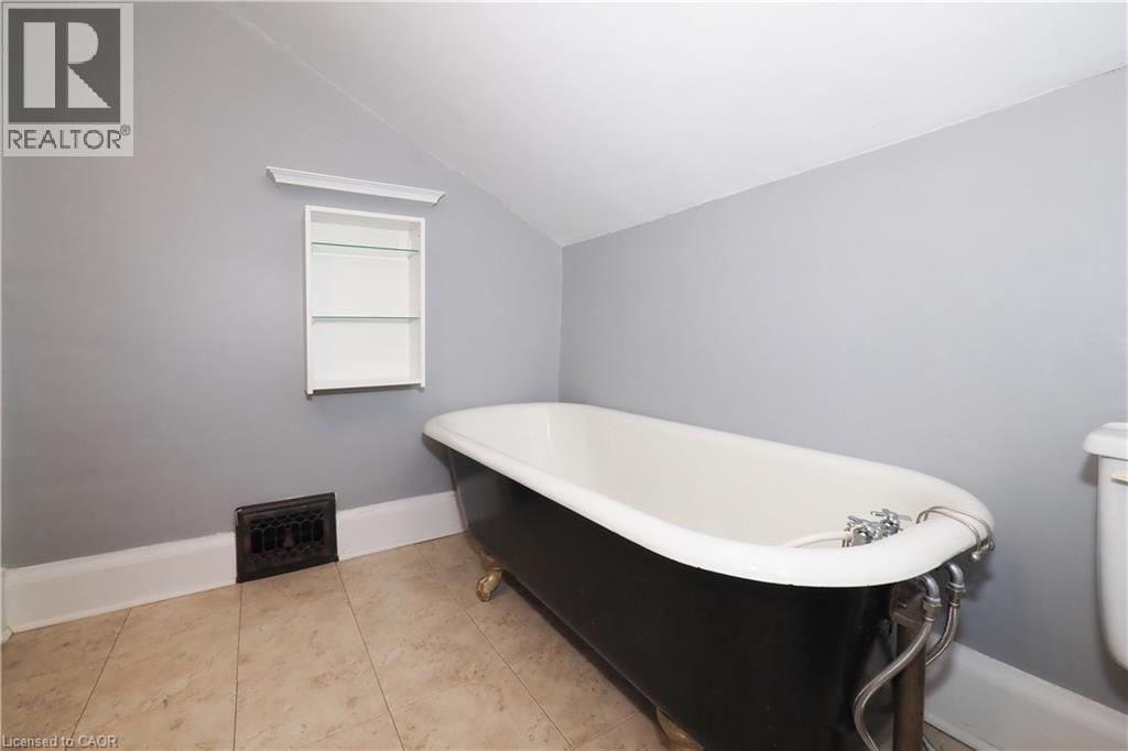 claw foot tub in 2nd floor bathroom - 33 Main Street E, Drayton, ON - Indoor Photo Showing Bathroom
