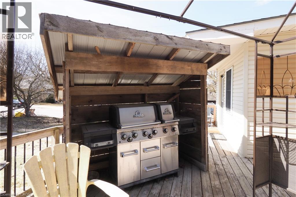 View of BBQ enclosure on main backyard deck - 33 Main Street E, Drayton, ON - Outdoor With Exterior