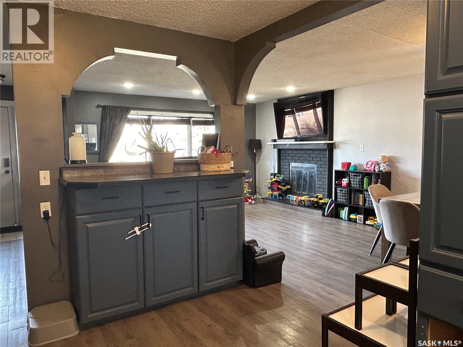 488 Willow Bay, Estevan, SK - Indoor With Fireplace