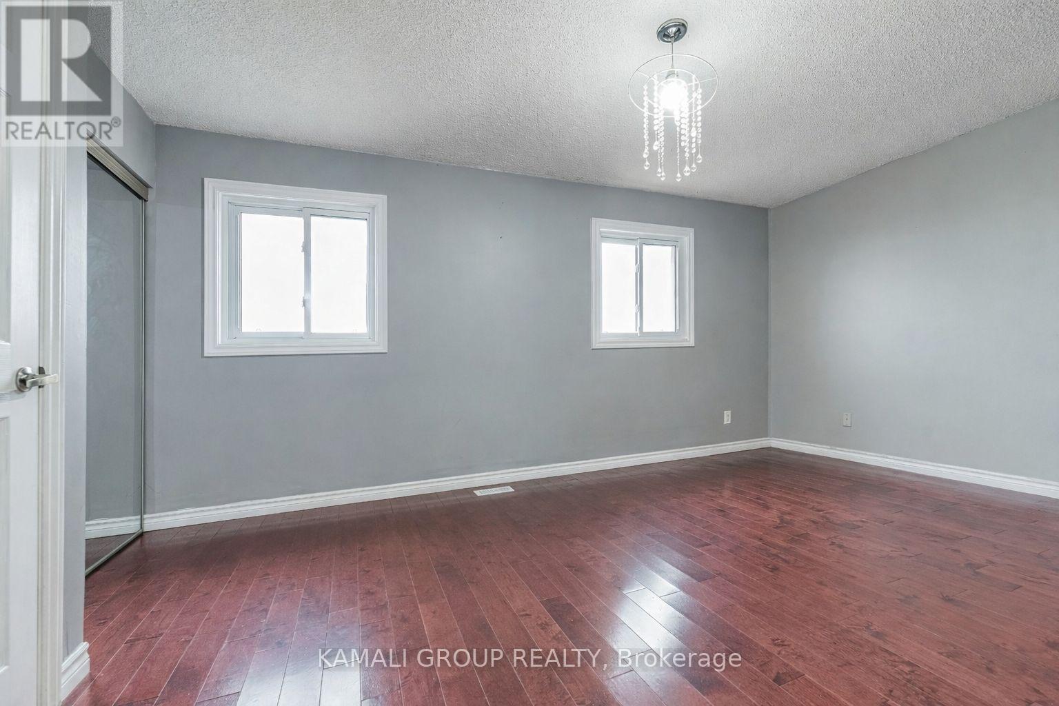 Primary Bedroom with Double Closet - Main - 77 Ecclestone Drive, Brampton, ON - Indoor Photo Showing Other Room