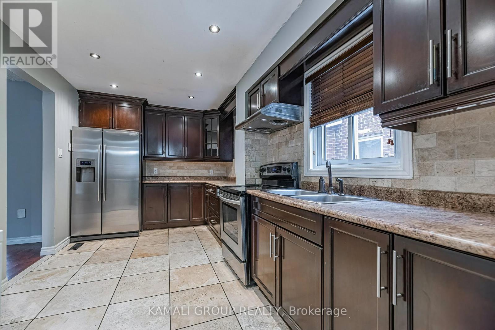 Stainless Steel Appliances - Main - 77 Ecclestone Drive, Brampton, ON - Indoor Photo Showing Kitchen With Double Sink