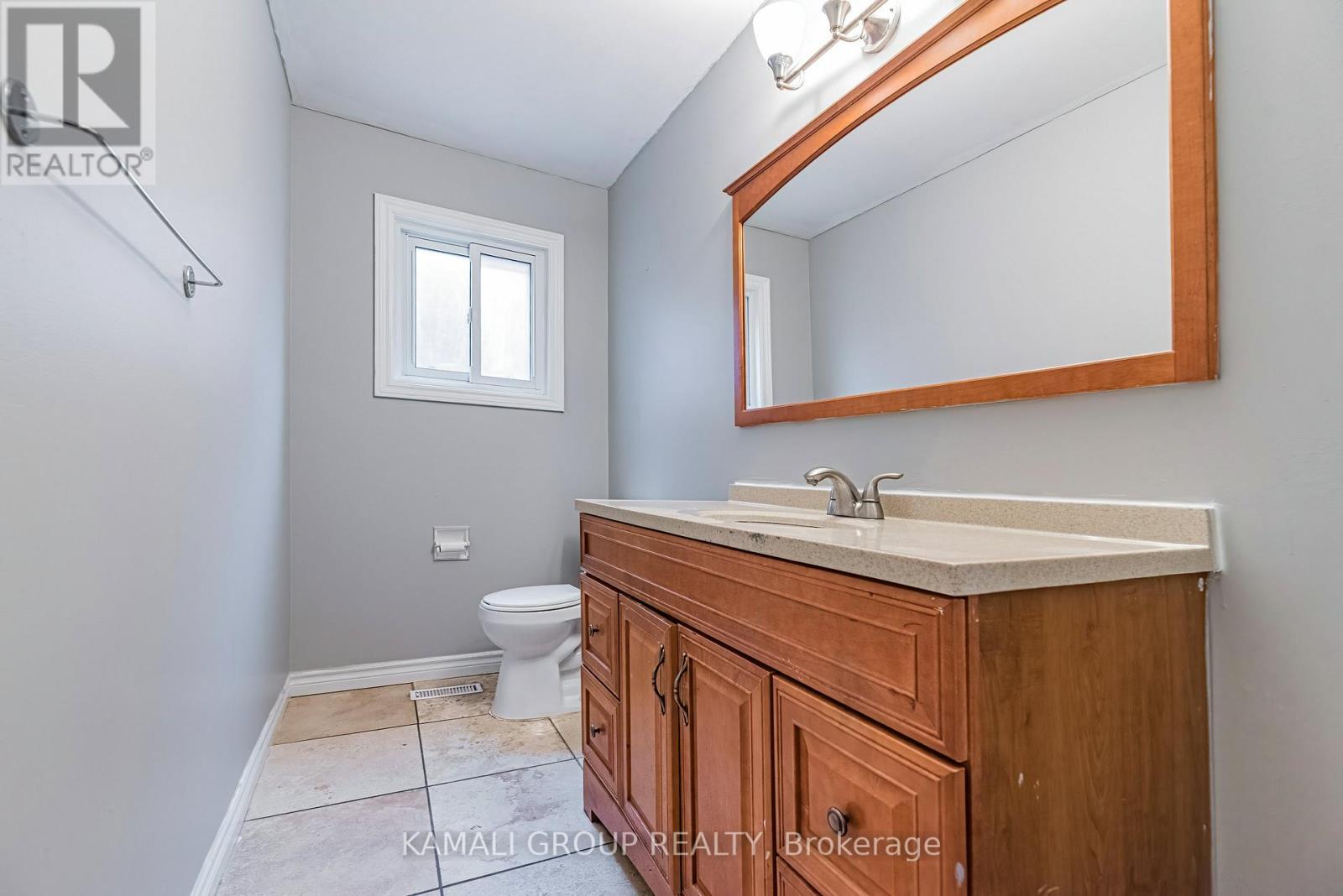 Main Floor Powder Room - Main - 77 Ecclestone Drive, Brampton, ON - Indoor Photo Showing Bathroom